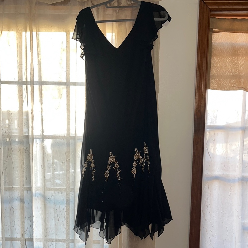 Beautiful, flutter sleeve black gown by SL Fashion. Size16W